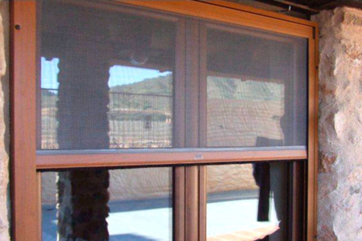 Instalar mosquitera enrollable